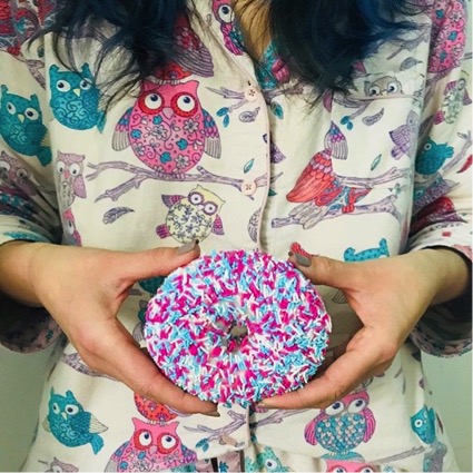 instagram buffalo girl holding donut